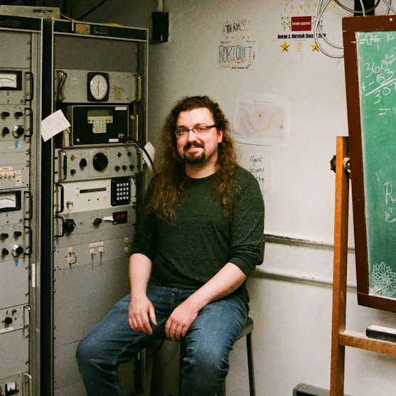 At the controls of the 40 foot radio telescope